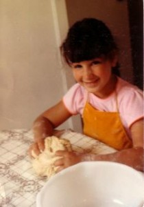 Ruth\'s daughter Joanna kneads challah dough. Photo by Ruth, Once Upon a Feast.